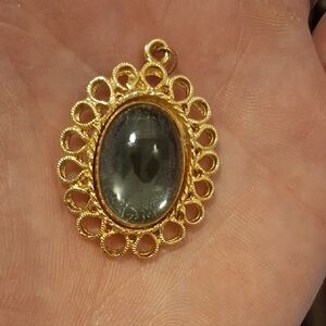 Elegant Gold and Black Pendant